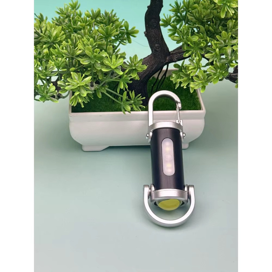 Tragbare Mini-Schlüsselanhänger-Taschenlampe in Silber als wasserdichtes Multifunktions-Notlicht mit wiederaufladbarem Akku - Bild 6