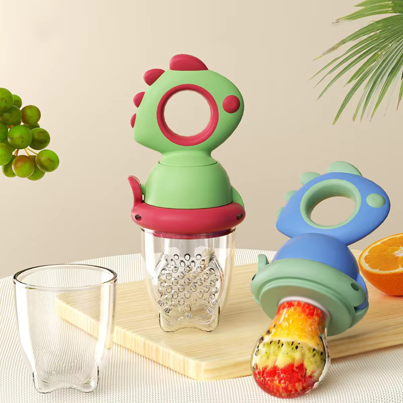 Dinosaurier Silikon Baby Fruit Feeder zum Drücken in Pink und Multicolour - Bild 1