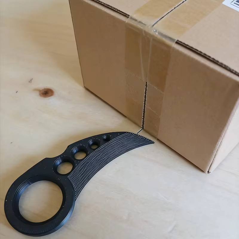 Praktischer Kartonöffner aus Kunststoff für schnelles Auspacken, erhältlich in Schwarz oder Weiß - Bild 3