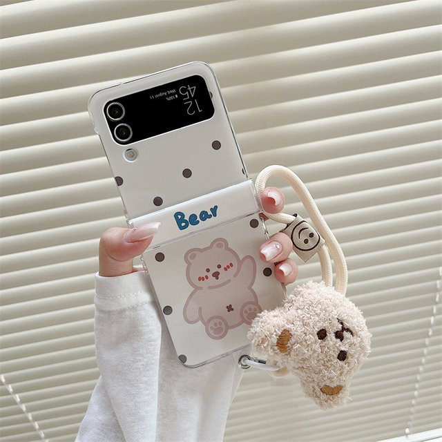 Samsung Galaxy Z Flip 7 6 5 4 3 Zflip7FE Handyhülle mit Koreanische Wave Point Cartoon Bär Design und Plüsch-Handgelenkschlaufe stoßfeste Abdeckung - Bild 1