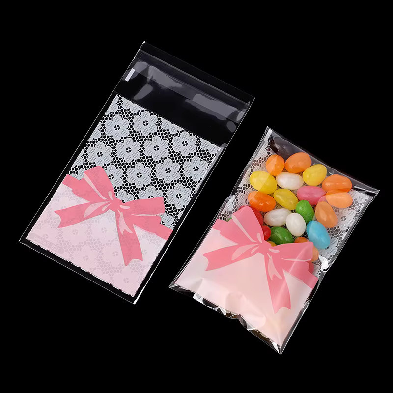 50 Stück Selbstklebende Blumen-Spitzen-Geschenktüten aus Kunststoff für Hochzeit, Geburtstag und Party, B: 7 cm, H: 10 cm - Bild 2
