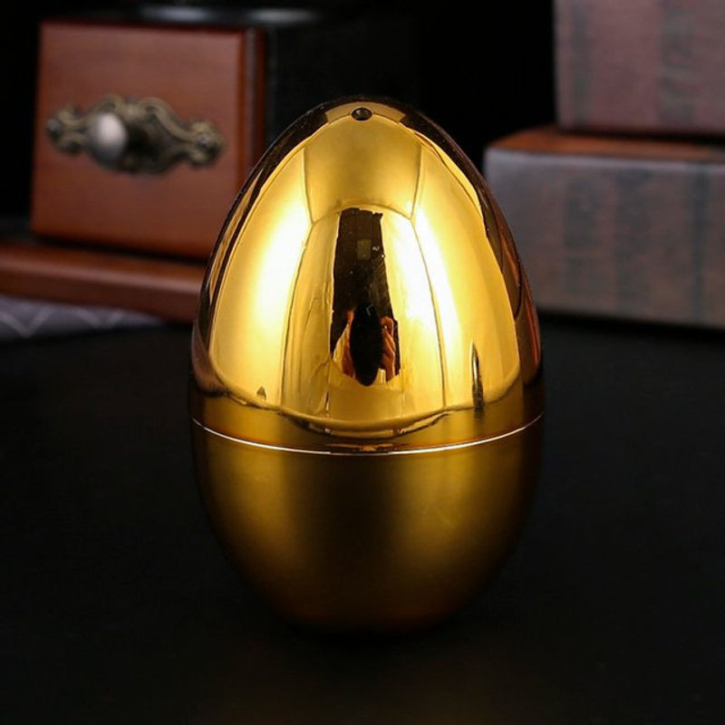 Eiförmige Zahnstocherbox aus Metall in Gold im Vintage-Design als geometrische Tischdekoration - Bild 1
