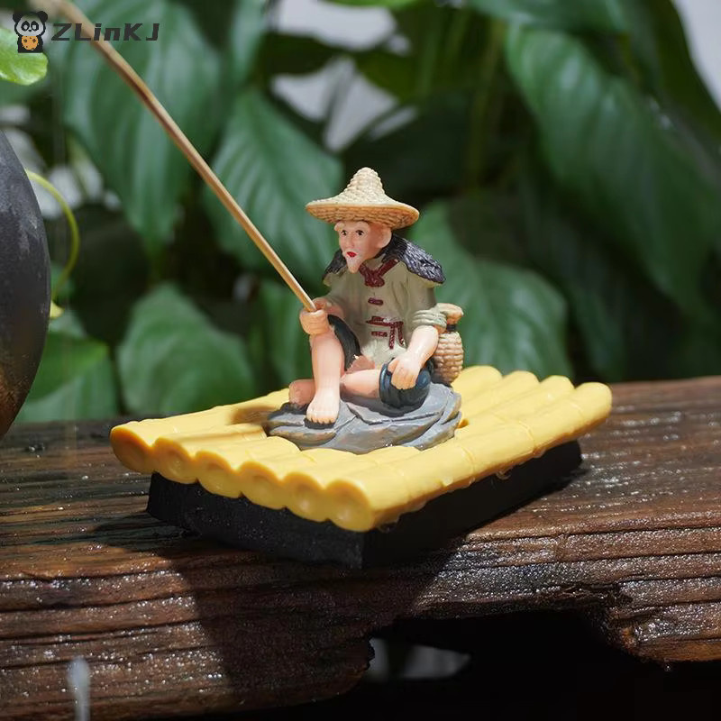 JETTING Gartenfigur Fischer auf Bambusfloß aus PVC in Multicolour für Aquarium und Außendekoration - Bild 2