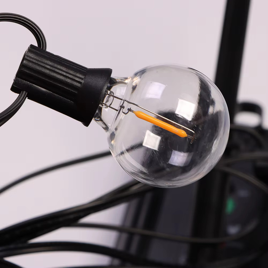 Solar-Lichterkette für den Außenbereich mit 30 LED G40 Kugelleuchten aus Glas, 12 m Länge, wasserdicht und solar- sowie USB-betrieben, transparent - Bild 5
