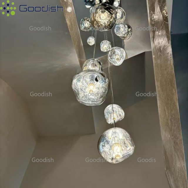 Moderne LED-Pendelleuchte im Lava-Lampe-Design aus Glas und Kunststoff, transparent mit silbernen Akzenten für Wohnzimmer und Küche - Bild 1