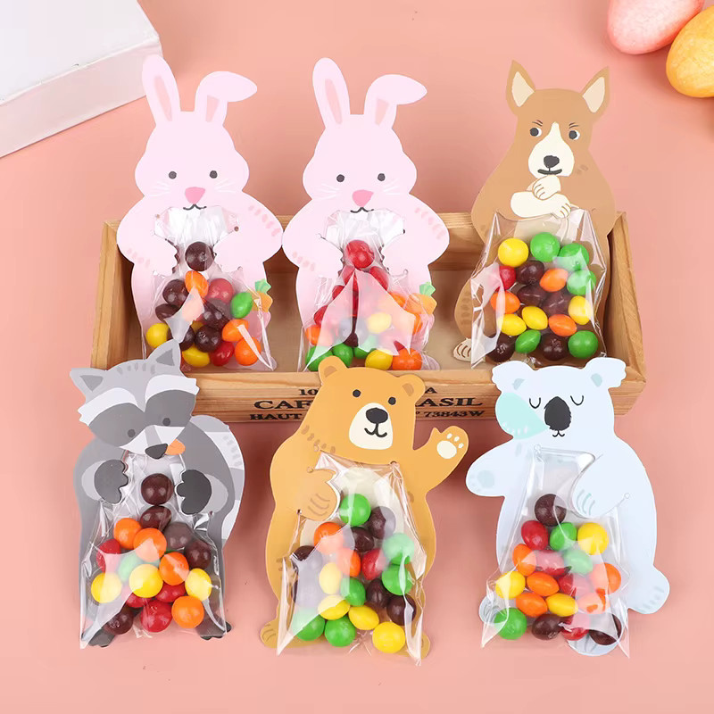 10 Stück ZQCXLD Cartoon Tier Süßigkeiten Taschen aus Papier in Mehrfarbig für Kindergeburtstag und Baby Shower als kreative Geschenktüten mit Kaninchen und Bär - Bild 1