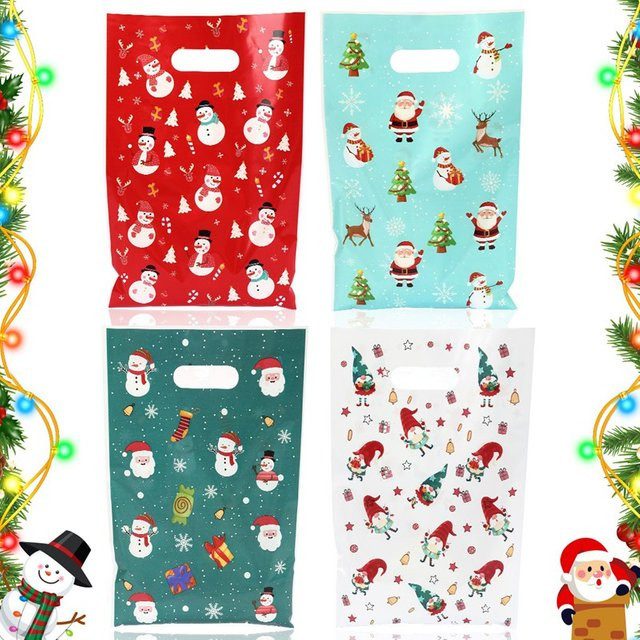 Bunte Weihnachts-Geschenktüten mit Weihnachtsmann und Schneemann Motiven zur Dekoration und Verpackung von Süßigkeiten - Bild 1