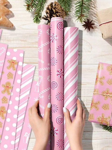 12 Blatt Weihnachts-Geschenkpapier in Pink mit Schneeflocken- und Lebkuchenmann-Muster, B: 70 cm, H: 51 cm - Bild 1