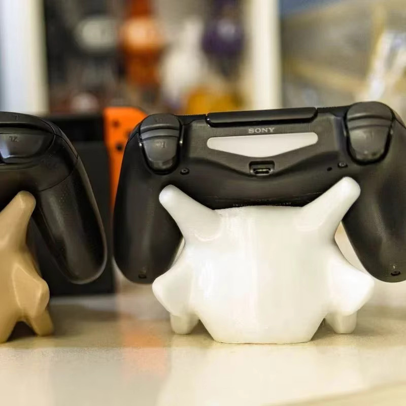 TAKARA TOMY Pokemon Cubone Game Controller Ständer in Weiß für Nintendo Switch Pro, PS5, Xbox Series und Xbox One sowie als Telefonhalter - Bild 4