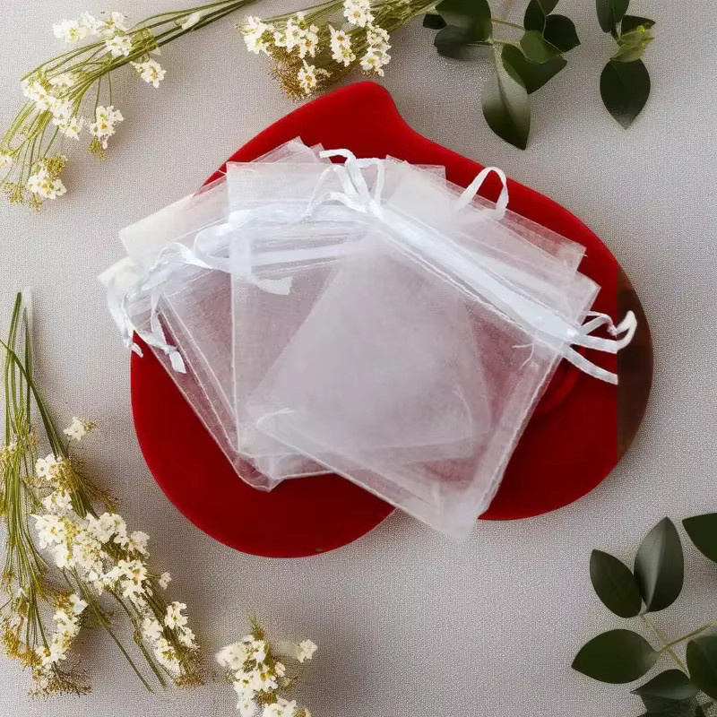 100 Stück weiße transparente Organza-Schmuckbeutel mit Kordelzug für Hochzeiten, Partys und Geschenke - Bild 2