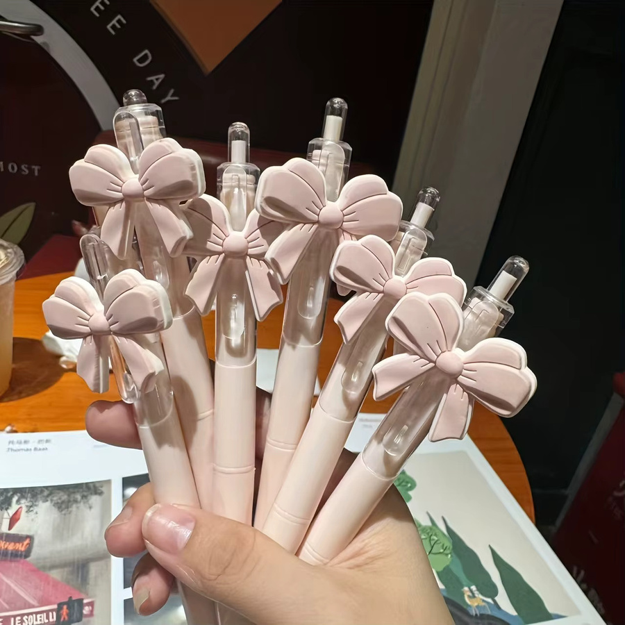 10 Stück rosa Gelstifte mit Schleifenknoten-Design als Klick-Kugelschreiber - Bild 4