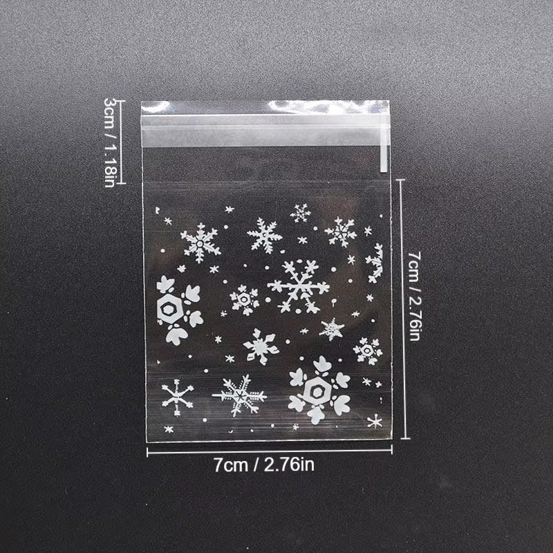 100 Stück Selbstklebende Schneeflocken Geschenkbeutel aus transparentem Kunststoff für Süßigkeiten, Kekse und Snacks zur Dekoration von Hochzeiten, Geburtstagen oder Weihnachtsfeiern - Bild 3