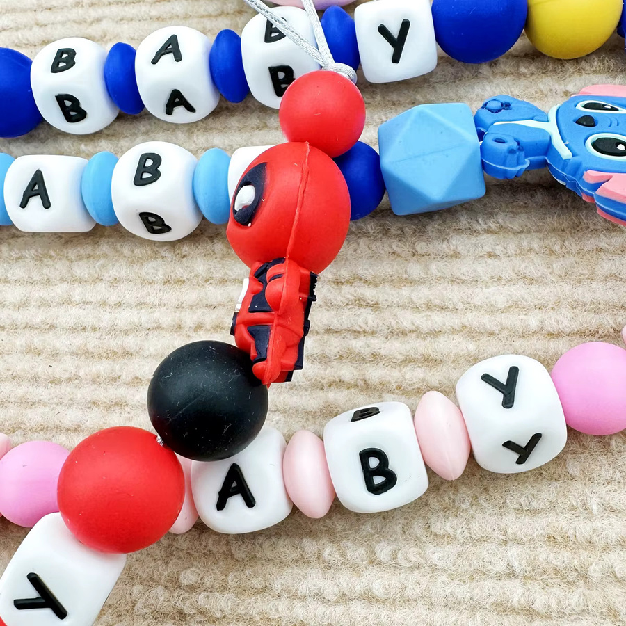 Disney Personalisierter Silikon Schnullerclip mit Beißring und Namensbuchstaben in Mehrfarbig - Bild 1