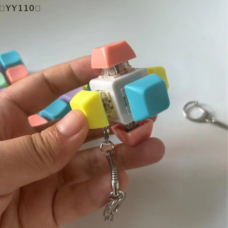 Velishy Schlüsselanhänger Anti-Stress-Finger-Tastatur, Unisex - Bild 2