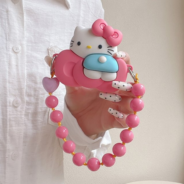 Sanrio Hello Kitty Silikon Schutzhülle mit Schleifen-Armband für Apple AirPods 1 2 3 4 Pro 2 Pro 3 in Pink - Bild 1