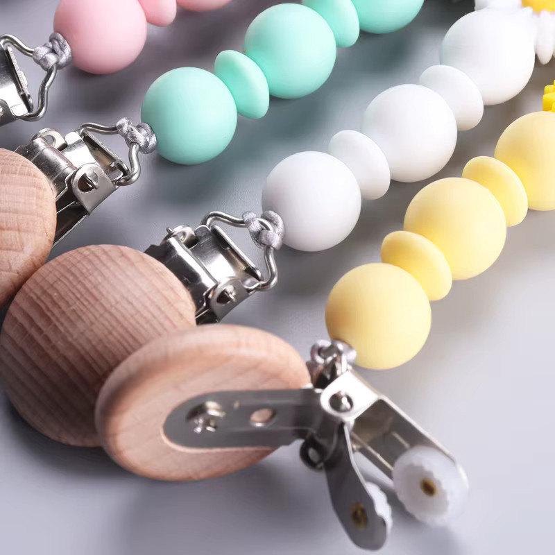 Handgemachte Baby Schnuller Kette aus Buche Holz und Silikon mit Daisy Perlen als Beißring und Zahnen Spielzeug in Natur, Rosa oder Bunt - Bild 2