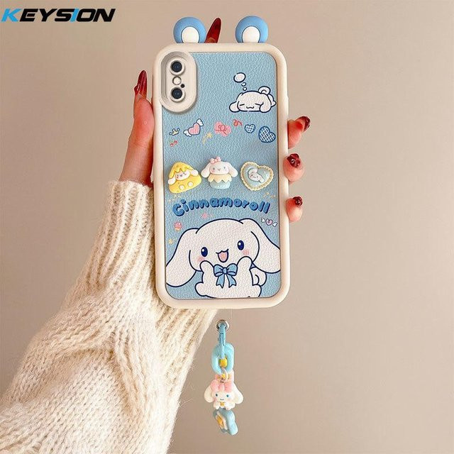 KEYSION 3D Cartoon Handyhülle mit niedlichen Ohren und Armband aus weichem Silikon für iPhone XS Max, iPhone X und iPhone XR in Blau - Bild 1