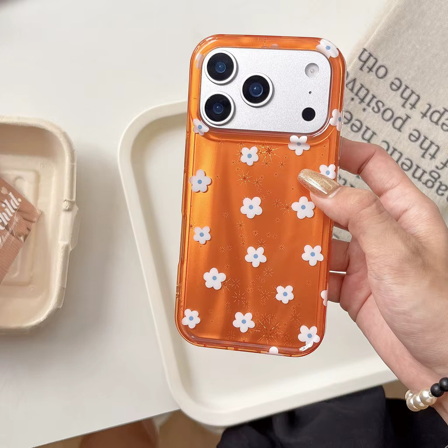 Stoßfeste Handyhülle für iPhone 17, 16, 15 und 14 Pro Max mit glänzendem orangefarbenem Hintergrund und weißen Blumenmustern - Bild 3