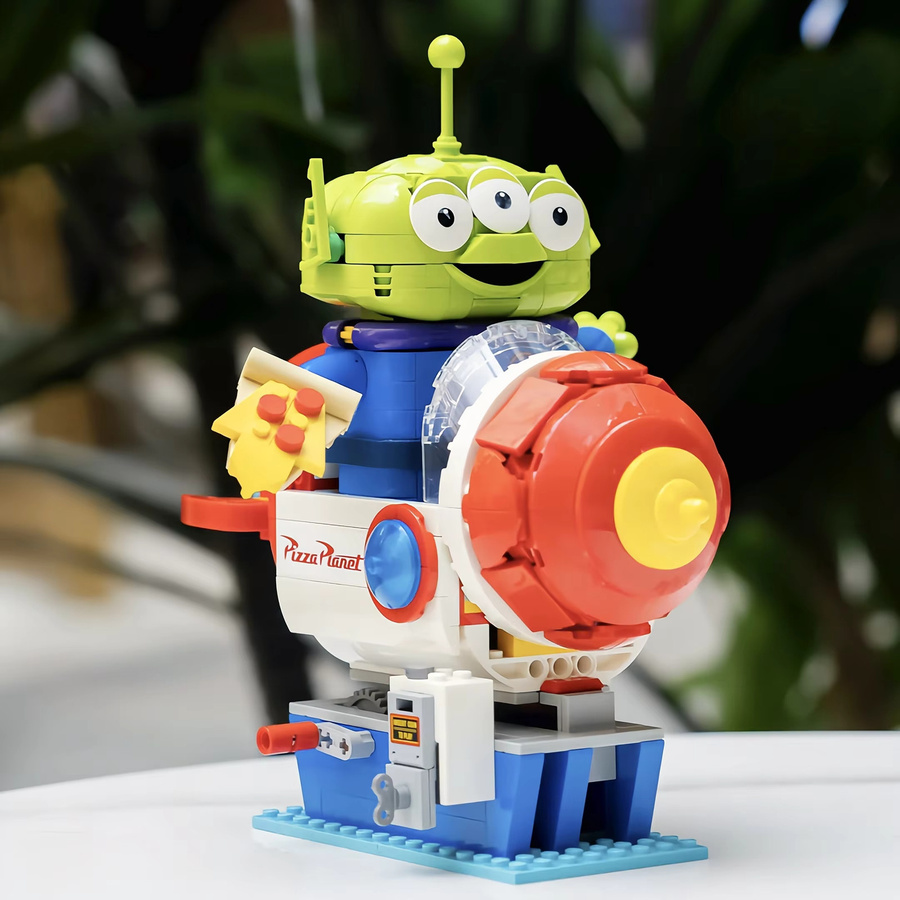 Potdemiel Toy Story Disney Alien mit Pizza Planet Raketenfahrt, Baustein-Modell, 570 Teile - Bild 2