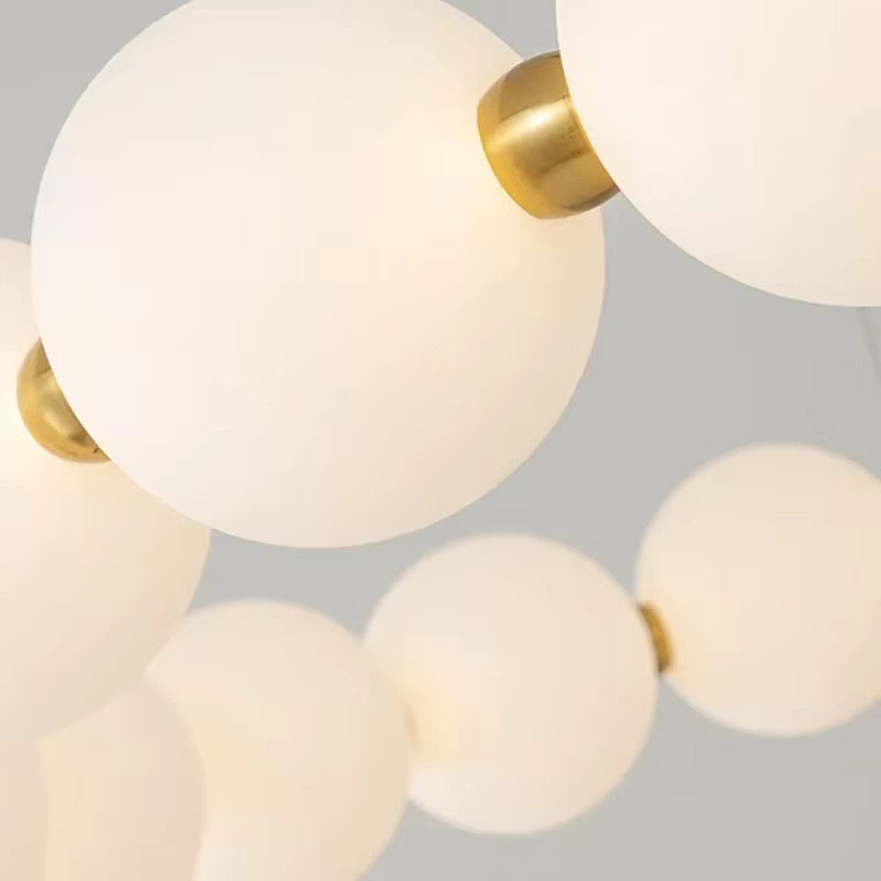 TAONUANSHU LED Kronleuchter im minimalistischen Ring-Design aus Glas und Metall in Beige und Weiß mit Gold/Messing-Akzenten für Wohnzimmer und Esszimmer - Bild 4