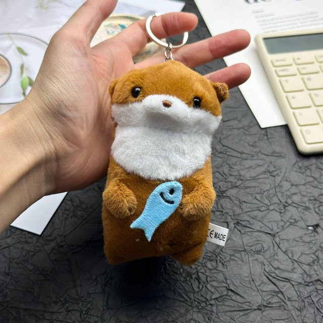 Binchi Fitness Otterfisch Plüschtier Schlüsselanhänger, ab 14 Jahren - Bild 1
