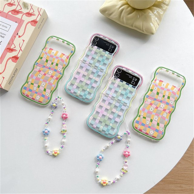 Handyhülle mit Gitter-Gänseblümchen-Design und Lanyard-Handgelenkkette für Samsung Galaxy Z Flip7, Z Flip6, Z Flip5, Z Flip4 und Z Flip3 in Multicolour - Bild 1