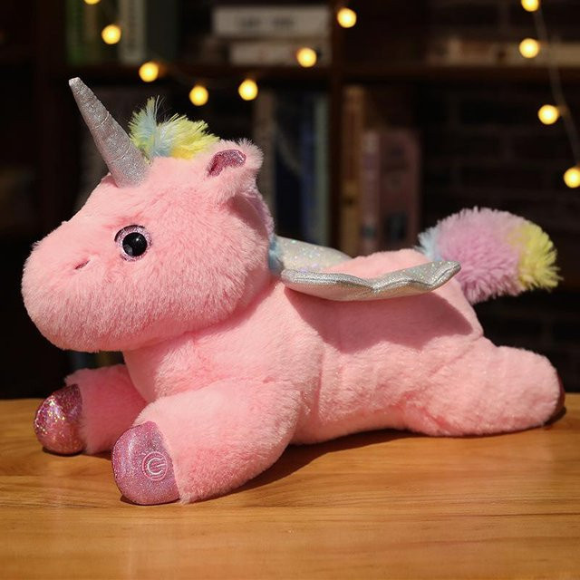 Einhorn-Puppe Plüschtier, liegend, rosa, weiß - Bild 1