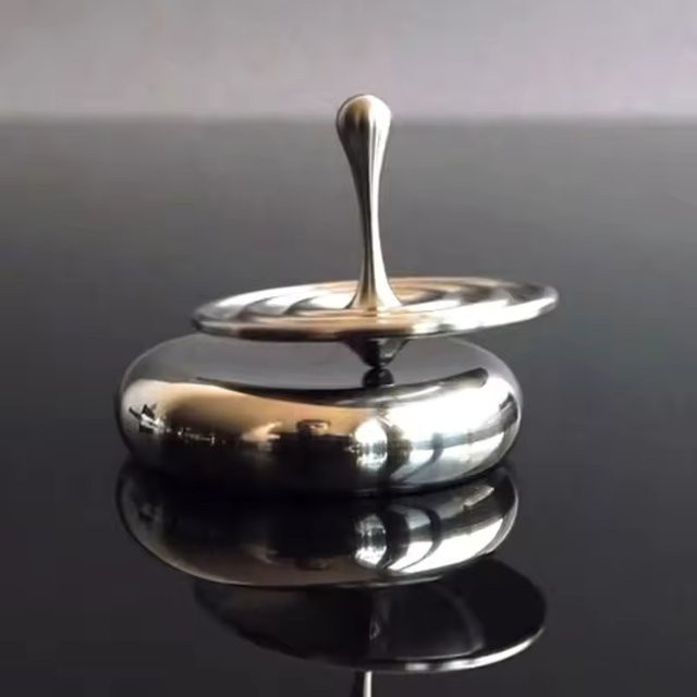 Meade Rotierendes Wassertropfen-Gyroskop, dekoratives Desktop-Tropfrohr, druckreduzierendes Spielzeug - Bild 1