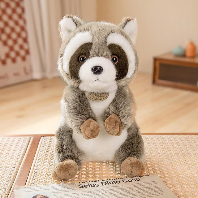 Kidsly Waschbär mit Glocken Mantel, Plüsch Spielzeug, 23cm, ab 14 Jahren - Bild 1