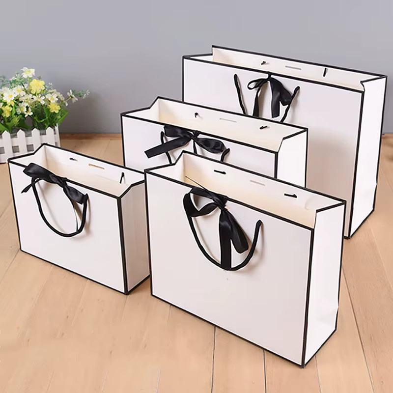 5 Stück tragbare Papiertaschen aus weißem Karton mit schwarzem Rand als Geschenkverpackung und Einkaufstasche - Bild 2