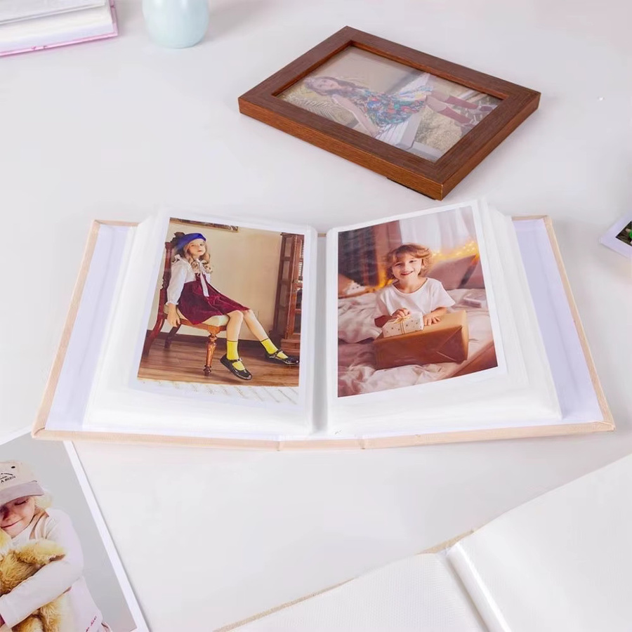 Fotoalbum mit 100 Taschen für 6 Zoll Fotos, laminiertes Einsteckalbum mit Stoffeinband in Braun - Bild 1