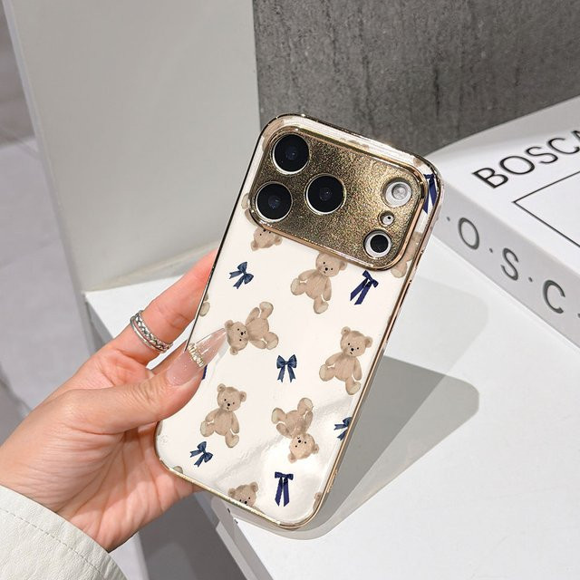 Potdemiel Handyhülle für iPhone 17 16 15 14 13 12 11 Pro Max 16E in Gold mit Teddybären und Schleifen-Design aus galvanisierter Glasschale - Bild 1