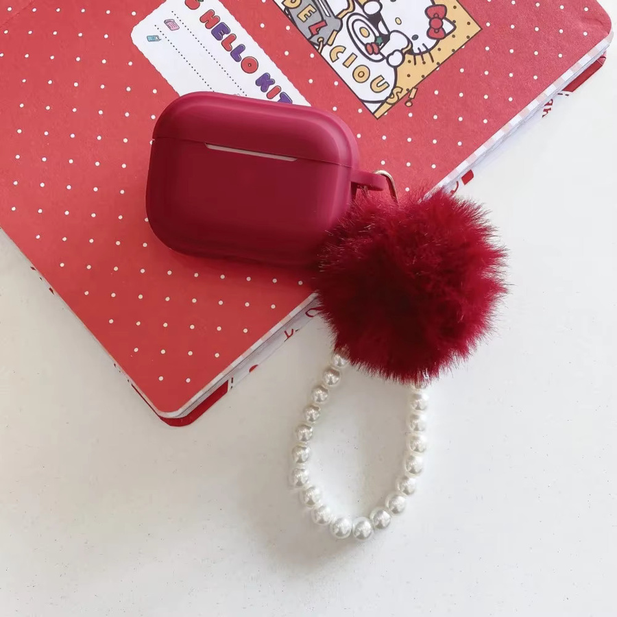 Silikon Schutzhülle für Apple AirPods Pro 1, 2 und 3 mit flauschiger Pom-Pom-Perlenkette in Schwarz - Bild 3