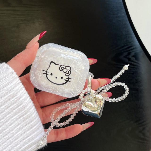 Sanrio Hello Kitty Schutzhülle mit Laser-Muster und Schleifenanhänger für Apple AirPods 4, 3, 2 und Pro 2/Pro 3, transparent - Bild 1