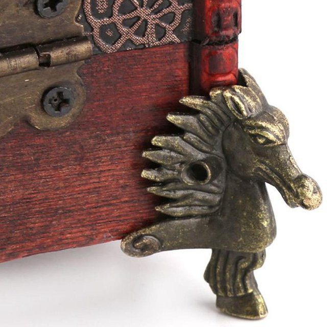 8er Set Shoemst Möbelbeine in Pferdekopfform aus Holz mit Eckwinkelschutz in Gold und Messingoptik - Bild 1