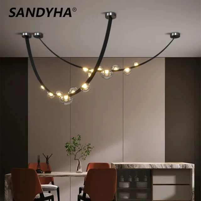 SANDYHA LED-Pendelleuchte aus Leder und Metall in Schwarz mit transparentem Glas und warmweißem Licht für Wohnzimmer und Flur - Bild 1