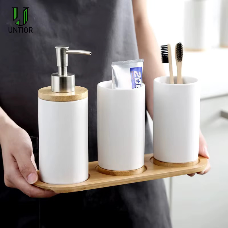 Untior Badezimmer Zubehör Set aus Keramik mit Seifenspender, Zahnbürstenhalter und Tumbler in Grau und Weiß - Bild 2