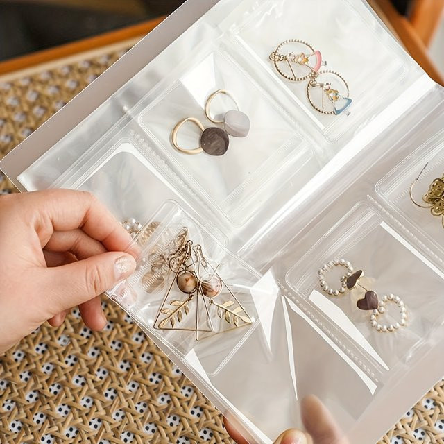 Transparentes Schmuck-Aufbewahrungsbuch mit 84 Zellen für Reisen und Organisation - Bild 1