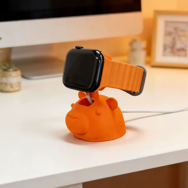 Niedlicher 3D-gedruckter Capybara-Ladeständer aus Kunststoff in Grün und Orange als Schreibtischdekoration - Bild 2