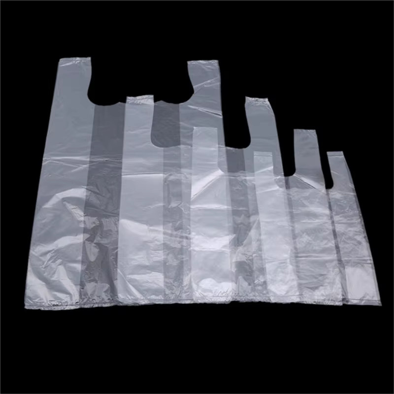 100 Stück transparente Plastiktüten mit Griff auf Rolle für Lebensmittel und Einkauf - Bild 1