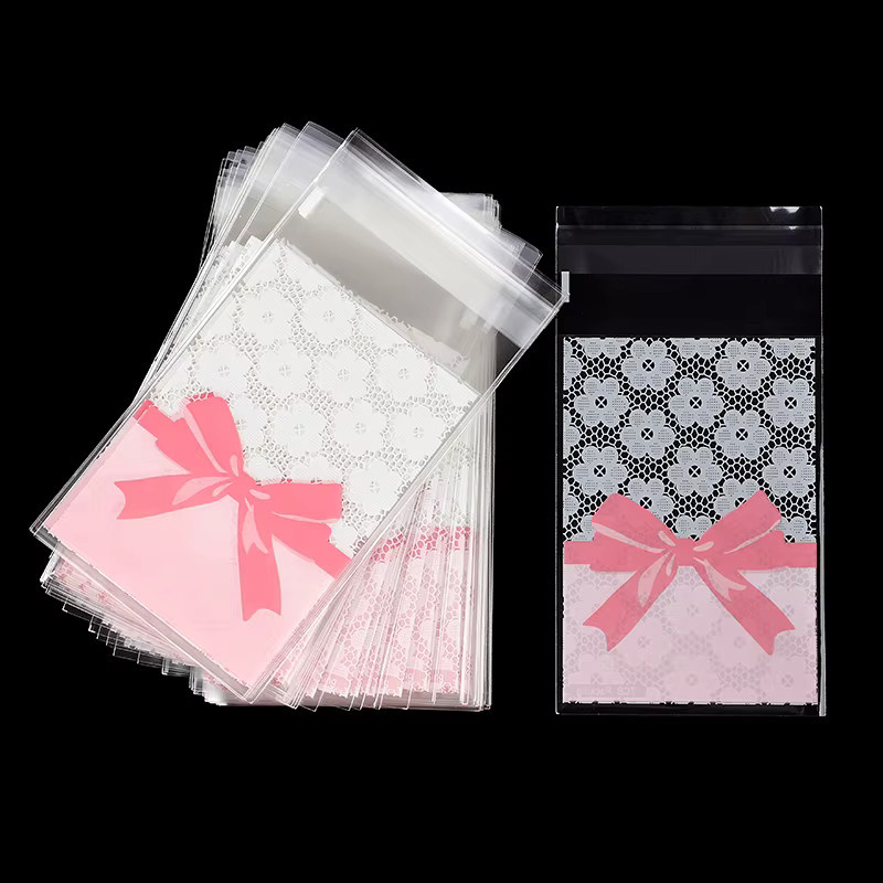 50 Stück Rosa Schleife und Blumen Motiv OPP Süßigkeiten Taschen Selbstdichtende Snack Verpackung für Geburtstag Hochzeit und Party - Bild 2