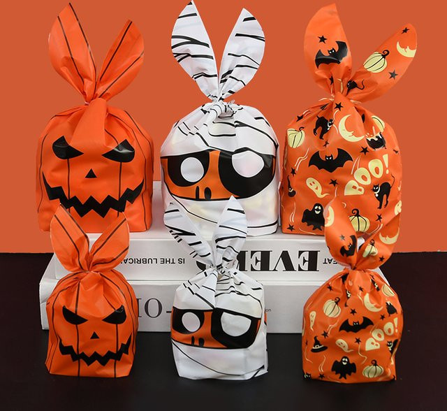 25 Stück Halloween Süßigkeiten Taschen mit Kürbis Geist und Kaninchen Ohren in Orange für Party Snacks und Geschenke von ZQCXLD - Bild 1