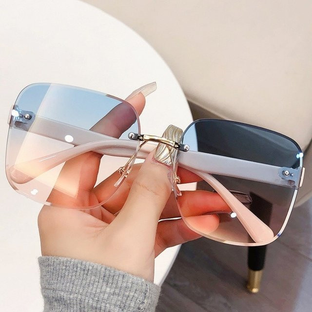 Quadratische Damen-Sonnenbrille, randlos, grau, Metall - Bild 1
