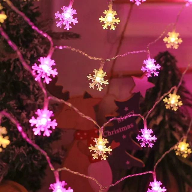Rosa LED Schneeflocken-Lichterkette mit warmweißem Licht für Dekoration zu Hochzeit, Party und Winterfesten - Bild 1
