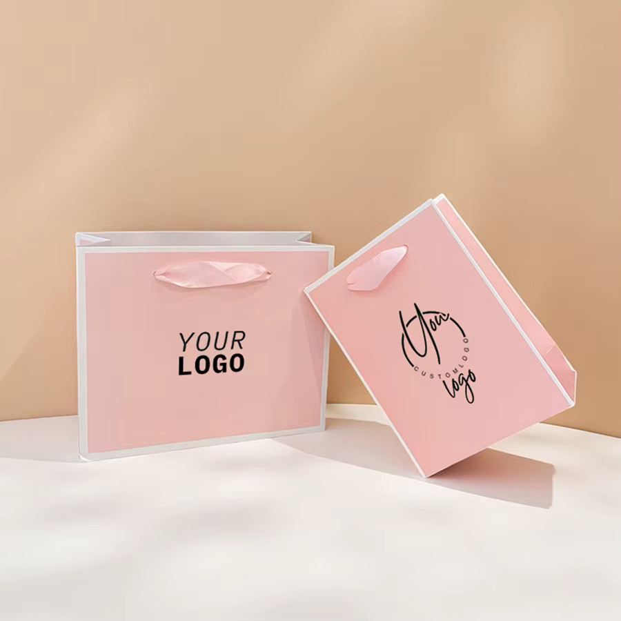 Personalisierte Papiertüten in Pink mit eigenem Logo für Schmuck, Kleidung und Hochzeitsgeschenke - Bild 1