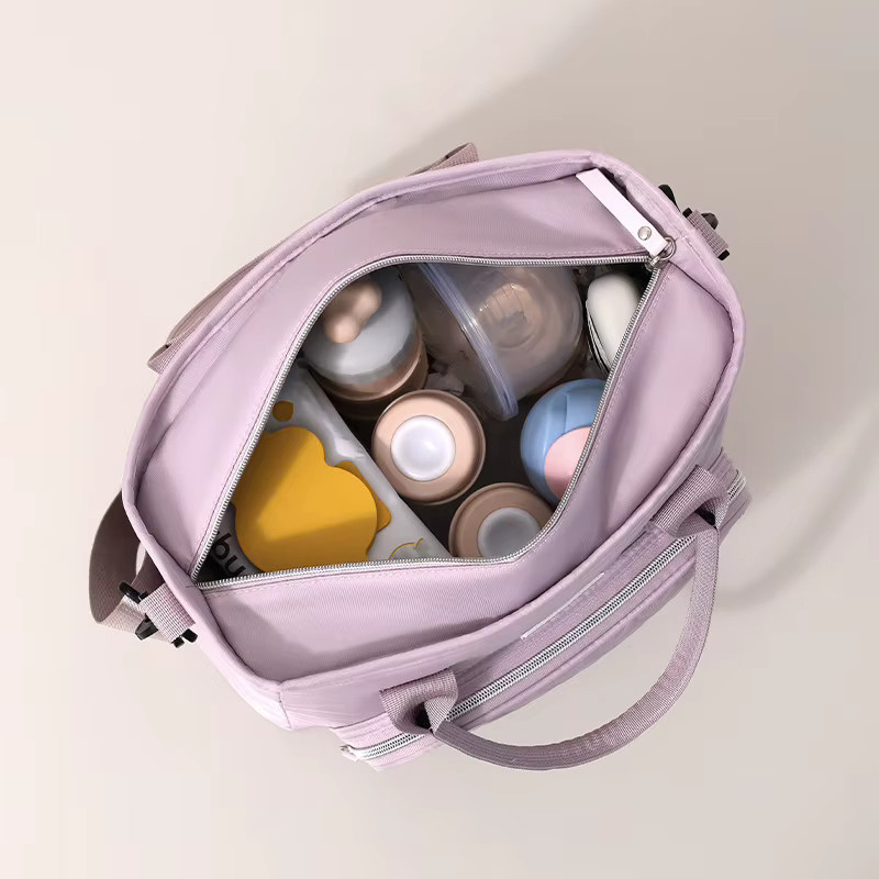 INS Premium Wickeltasche als multifunktionale Thermo-Reisetasche für Babys und Mamas in Schwarz oder Pink - Bild 3