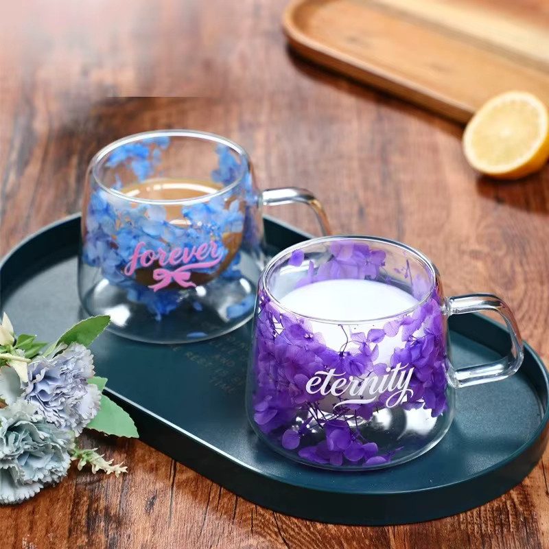 JUSTINLAU Doppelwandige Glastasse aus Borosilikatglas mit Blumenmuster in Transparent und Blau - Bild 1