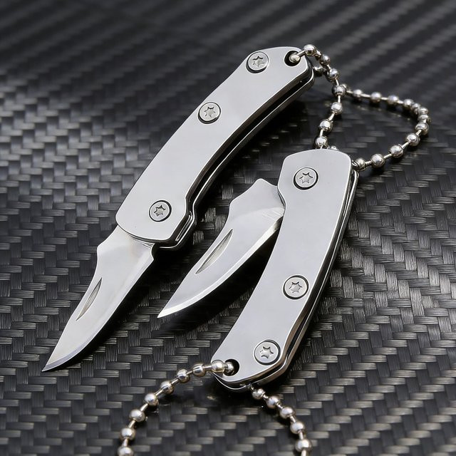 Tragbares Mini-Messer aus Edelstahl in Silber und Weiß für Outdoor, Camping und Reisen - Bild 1