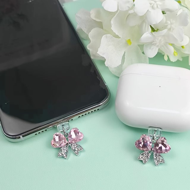 Strass-Schmetterling Staubschutz für iPhone und USB-C in Pink - Bild 1