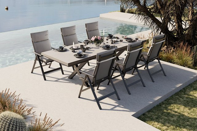 OUTFLEXX Serro Garten-Essgruppe aus Alu, Steinimitat und Textilene in Anthrazit Matt, ausziehbarer Esstisch mit 6 Klappstühlen und Auflagen, B/T/H: 262 x 100 x 75 cm (bei 260 cm Länge) bzw. 200 x 100 x 75 cm (bei 200 cm Länge) - Bild 1